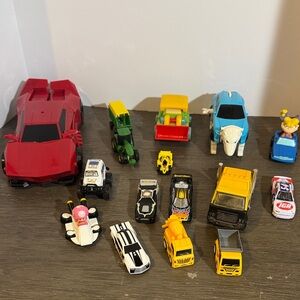 Cars lot of 15 different stands and sizes